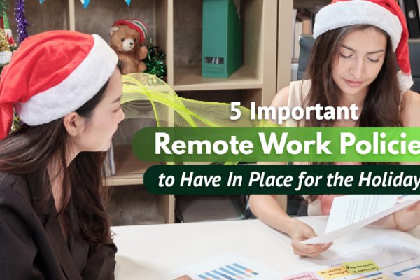 Office colleagues discussing while wearing festive Christmas hats